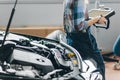 Mechanis using code readers and scan tools Royalty Free Stock Photo