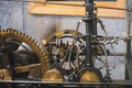 The mechanism of the gears of a large mechanical clock