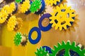 mechanism of multi-colored gears, assembled puzzle. Business concept idea, teamwork, cooperation. collective creative