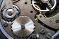 Mechanism of old mechanical watches with a pendulum, gears and other details Royalty Free Stock Photo