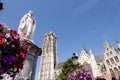 Mechelen, Belgium, August 2019. Beautiful view of the cathedral in the background. In the foreground on the left, the statue of