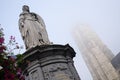 Statue of Margaret of Austria in the center of Mechelen, Belgium, Sint-Rumbolds tower in back