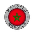 Medallion with the name of the country of Morocco and a round fl