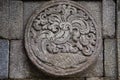 medallion in the penataran temple with animal reliefs