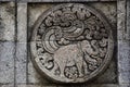 medallion in the penataran temple with animal reliefs