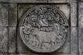 medallion in the penataran temple with animal reliefs