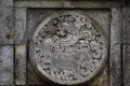 medallion in the penataran temple with animal reliefs