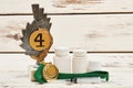 Medals and drugs on wood. Royalty Free Stock Photo