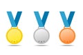 Gold, silver and bronze medals with blue ribbons. Vector medals isolates with shadow on white background