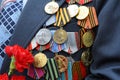 Medals and orders of the Soviet Union on costume of a veteran of the World War II. Celebration of Victory Day Royalty Free Stock Photo