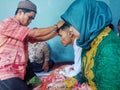 Medan, Indonesia, 10 January 2021 brother who gave his sister's blessing to marry.