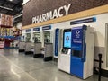 The MedAvail Self Service Pharmacy kiosk in the Pharmacy department waiting for customers to pick up their prescriptions at a Sams