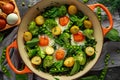 One Pan Green shakshuka with kale, broccoli, sweet peas, spinach and dill with free range eggs, perfect supper. Royalty Free Stock Photo