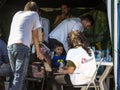 Medecins Sans Frontieres doctors discussing with a refugees family crossing border with Croatia. MSF is an NGO providing doctors