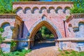 The medeival brick arched Neo-Gothic portal in Monza Royal Gardens (Giardini Reali di Monza), Italy