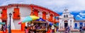 Medellin, Colombia - December 19, 2017: Panoramic view of colorful buildings and some people walking around in Pueblito Royalty Free Stock Photo