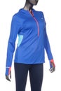 Medellin, Colombia - July 27, 2019: Newbalance, long-sleeved sports jacket for women; photo in mannequin on white background Royalty Free Stock Photo