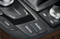 Media control buttons on the dashboard in black leather modern c Royalty Free Stock Photo