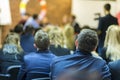 Professional Mediators Having a Public Discussion at the Round Table on Stage Before the Audience