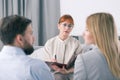 Mediator talking to a couple during a session Royalty Free Stock Photo