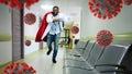 Medic acts like a superhero in hospital to fight pandemic of covid19 coronaviruses. Blue background