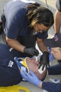 Medic checks the eyes for signs of a concussion Royalty Free Stock Photo