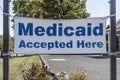 Medicaid Accepted Here sign. Medicaid is a federal and state program that helps with medical costs for people with limited income Royalty Free Stock Photo