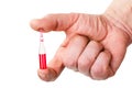 Medical ampoule in a hand Royalty Free Stock Photo