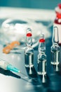 Medical ampoule and syringe. Royalty Free Stock Photo