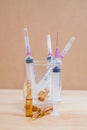 Medical ampoule and syringe. Vials of medications