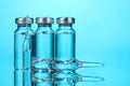 Medical ampoules on blue