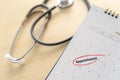 Medical appointment book in the calendar stethoscope and calendar schedule to check up Royalty Free Stock Photo