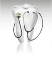 Medical background with tooth and a stethoscope.