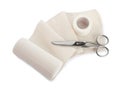 Medical bandage roll, sticking plaster and scissors on white background, above view Royalty Free Stock Photo