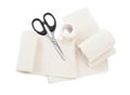 Medical bandage rolls, sticking plaster and scissors on white background, above view Royalty Free Stock Photo