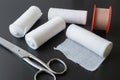 Medical bandages with scissors and sticking plaster. Royalty Free Stock Photo