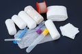 Medical bandages with sticking plaster and syringes Royalty Free Stock Photo