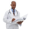 Medical, black man and doctor reading paperwork of hospital records, medicine report or clinic research binder Royalty Free Stock Photo