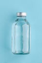 Medical bottle on blue background Royalty Free Stock Photo