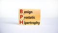 Medical and BPH, Benign Prostatic Hypertrophy symbol. Wooden blocks with the word `BPH`. Beautiful white background. Copy space. Royalty Free Stock Photo