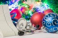 Medical cardiology Christmas and New Year photo - stethoscope and electrocardiogram tape are located near balls for Christmas tree