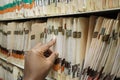 Medical charts and records african american man sorting