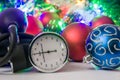 Medical Christmas and New Year photo - blood pressure gauge or sphygmomanometer are located near balls for Christmas tree in blurr