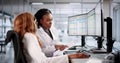 Medical coder enters billing codes into spreadsheet