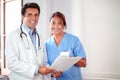 Medical colleagues looking and smiling at you Royalty Free Stock Photo