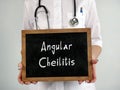 Medical concept about Angular Cheilitis with phrase on the piece of paper
