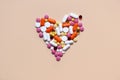 Medical concept. Assorted pharmacological preparations, tablets and pills in the shape of a heart. Treatment with pills. Place for Royalty Free Stock Photo
