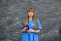 Medical concept. Beautiful young nurse in blue uniform holds pills Royalty Free Stock Photo