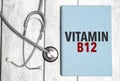 Medical concept. Blue notebook with the inscription - vitamin b12