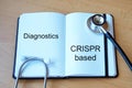 medical concept. CRISPR Based Diagnostics . words written in medical notebook with stethoscope Royalty Free Stock Photo